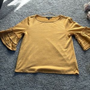 Small bell sleeve top